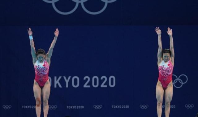 世界杯移动端直播-为彼此戴上闪耀的金牌 施廷懋与王涵赛后感慨万千